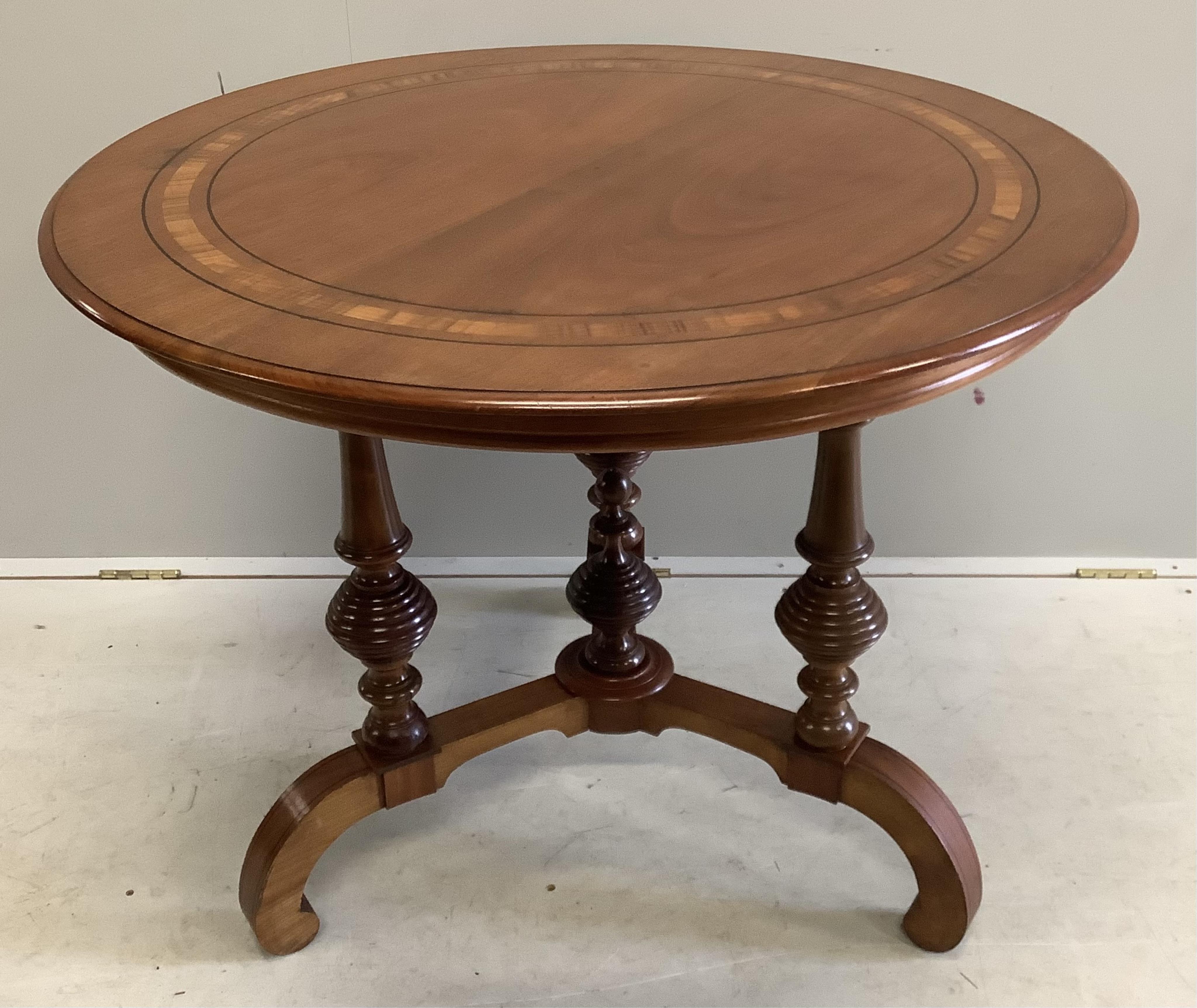 A 19th century Continental circular centre table, diameter 94cm, height 75cm. Condition - good